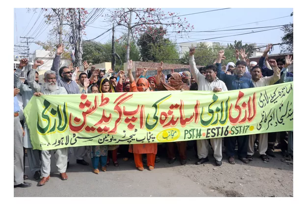 the banner wielding protesters gathered near lahore press club and raised slogans against the government photo express the banner wielding protesters gathered near lahore press club and raised slogans against the government photo express