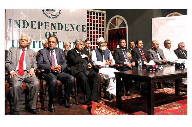 ameer jamaat e islami senator siraj ul haq ppp leader qamar zaman qaira and others present during the seminar entitled quot independence of institutions quot photo inp