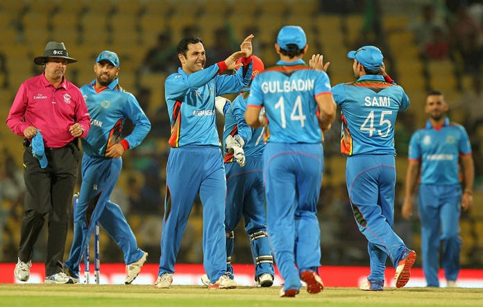 mohammad nabi celebrates with teammates after the dismissal of ryan campbell during the world t20 match at vidarbha cricket association stadium in nagpur on march 10 2016 photo afp