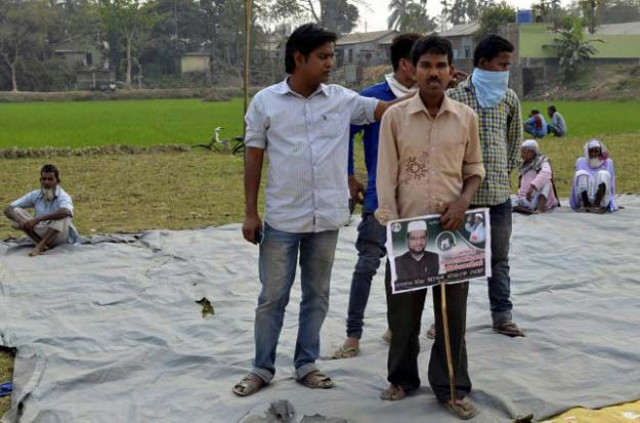 supporters of the all india united democratic front aiudf attend an election campaign rally in jaleswar village in assam india march 3 2016 photo reuters supporters of the all india united democratic front aiudf attend an election campaign rally in jaleswar village in assam india march 3 2016 photo reuters