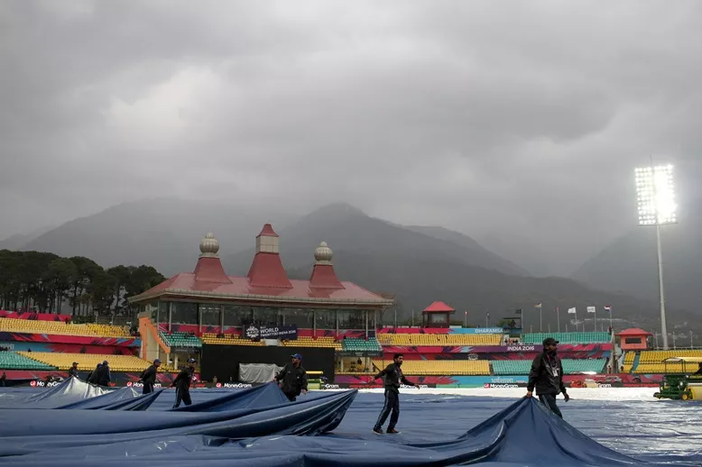 groundstaff cover the wicket as rain falls ahead of the world t20 match between oman and the netherlands at the himachal pradesh cricket association stadium in dharamsala on march 11 2016 photo afp groundstaff cover the wicket as rain falls ahead of the world t20 match between oman and the netherlands at the himachal pradesh cricket association stadium in dharamsala on march 11 2016 photo afp