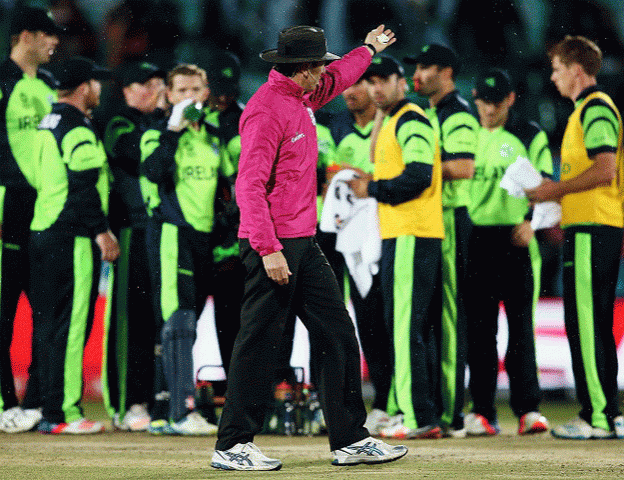 nigel llong asks the ireland players to walk off the field in dharamsala india on march 11 2016 photo courtesy icc nigel llong asks the ireland players to walk off the field in dharamsala india on march 11 2016 photo courtesy icc