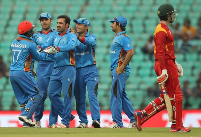 afghanistan thrash zimbabwe by 59 runs to qualify for next round afghanistan thrash zimbabwe by 59 runs to qualify for next round