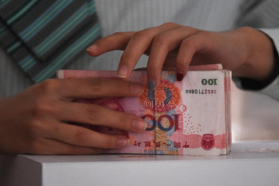slowing economy china s bank loans plunge in february