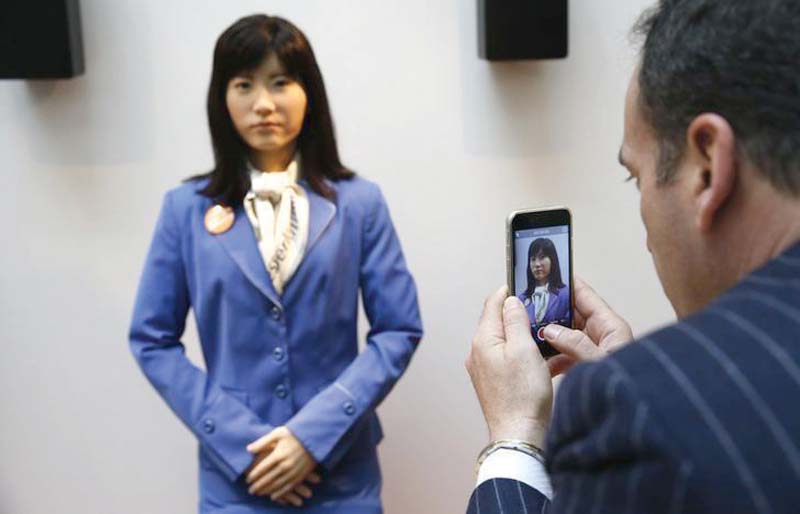 chihira kanae was joined at the itb fair by another robot host mario photo reuters