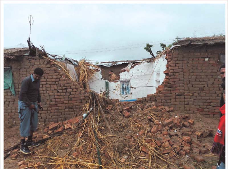 a home that collapsed after rains in gujar khan photo asad malik express