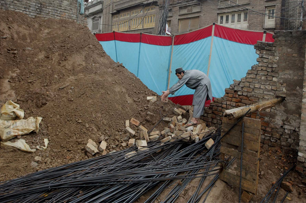 view of damages due to heavy downpour at khan mast colony in peshawar photo ppi