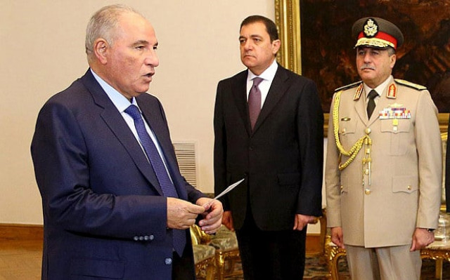 ahmed el zend left being sworn in as justice minister last year photo reuters ahmed el zend left being sworn in as justice minister last year photo reuters