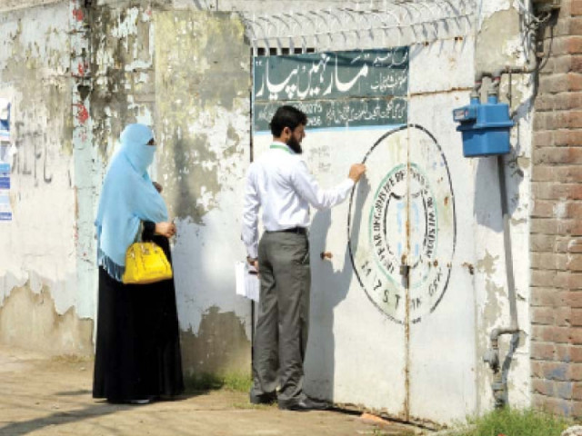 a polio team at work in gujranwala photo express a polio team at work in gujranwala photo express