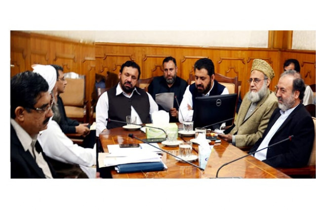 k p minister for finance muzaffar sayed chairing a meeting of k p finance commission at civil secretariat peshawar photo online