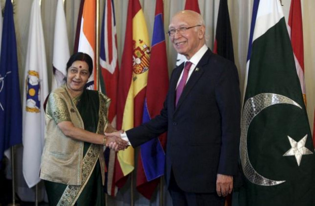advisor to prime minister for foreign affairs sartaj aziz r shakes hands with indian foreign minister sushma swaraj l after their meeting at the foreign ministry in islamabad pakistan on december 9 2015 photo reuters advisor to prime minister for foreign affairs sartaj aziz r shakes hands with indian foreign minister sushma swaraj l after their meeting at the foreign ministry in islamabad pakistan on december 9 2015 photo reuters