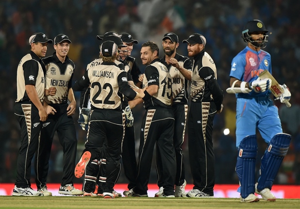 new zealand players celebrate after the wicket of india 039 s batsman shikhar dhawan during their world t20 opener photo afp