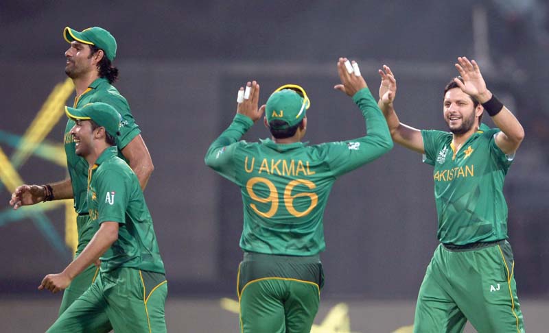 afridi r celebrates with teammates during pakistan s match against bangladesh at the eden gardens cricket stadium in kolkata photo afp