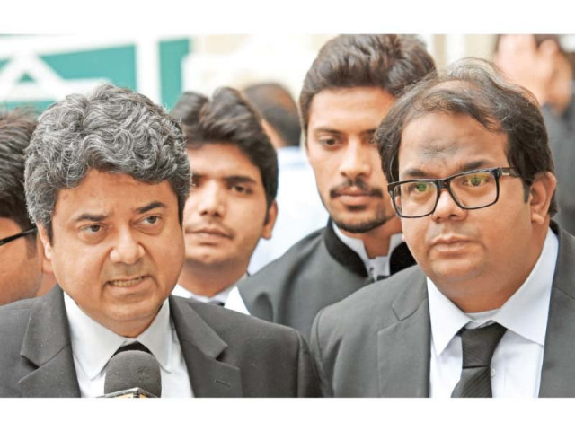 farogh naseem and faisal hussain lawyers of pervez musharraf talk to the media outside the supreme court photo afp farogh naseem and faisal hussain lawyers of pervez musharraf talk to the media outside the supreme court photo afp