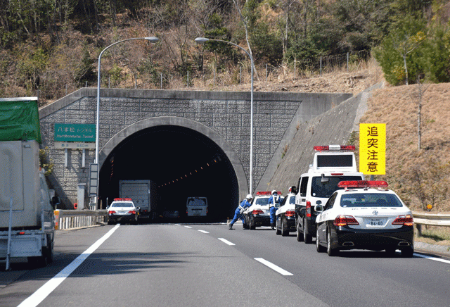 police vehicles gather at the entrance of the 860 metre hachihonmatsu tunnel in hiroshima prefecture on march 17 2016 photo afp police vehicles gather at the entrance of the 860 metre hachihonmatsu tunnel in hiroshima prefecture on march 17 2016 photo afp