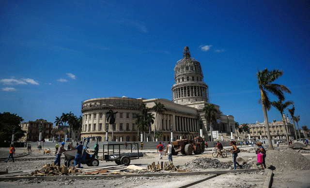 workers repair a street near the capitol in havana on march 16 2016 during preparations ahead of us president barack obama 039 s visit photo afp workers repair a street near the capitol in havana on march 16 2016 during preparations ahead of us president barack obama 039 s visit photo afp