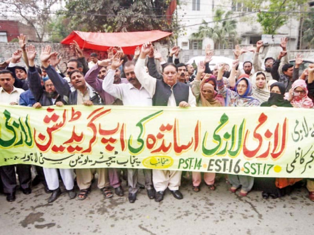 teachers say the government had promised to upgrade their pays photo abid nawaz express teachers say the government had promised to upgrade their pays photo abid nawaz express