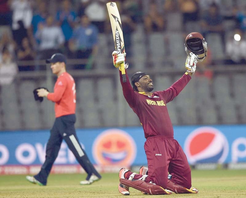 gayle was compared with west indies legend viv richards by coach phil simmons after the left hander scored his second world t20 century photo afp