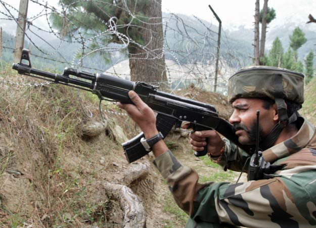 an indian army soldier take his position near his camp photo reuters