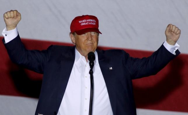 u s republican presidential candidate donald trump reacts after being introduced at a campaign rally at the sunset cove amphitheater in boca raton florida march 13 2016 photo reuters