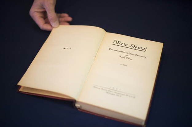 nazi leader adolf hitler 039 s political manifesto mein kampf discovered at his munich apartment and signed by eleven american officers is on display march 18 2016 before auction at alexander historical auctions in chesapeake city photo afp