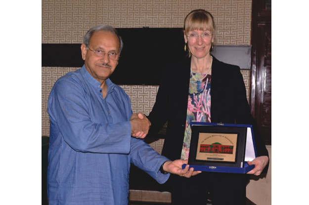 dr qaiser mushtaq vice chancellor of the islamia university of bahawalpur iub presenting a shield to german ambassador to pakistan ina lepel photo express