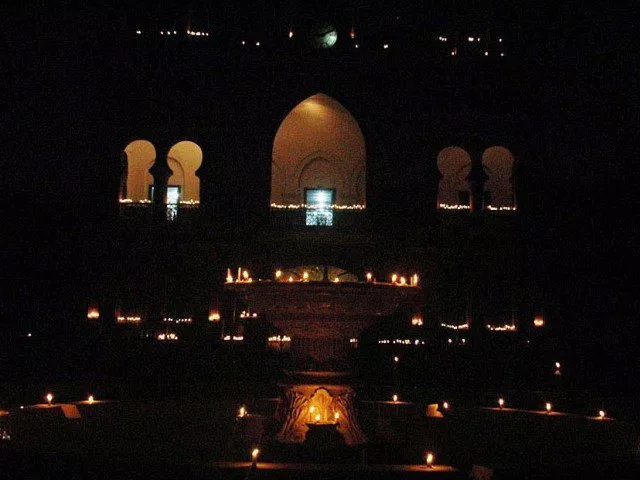 town hall seen lit with candles during earth hour photo online town hall seen lit with candles during earth hour photo online