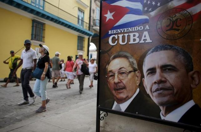 tourists pass by images of u s president barack obama and cuban president raul castro in a banner that reads 039 039 welcome to cuba 039 039 at the entrance of a restaurant in downtown havana march 17 2016 photo reuters tourists pass by images of u s president barack obama and cuban president raul castro in a banner that reads 039 039 welcome to cuba 039 039 at the entrance of a restaurant in downtown havana march 17 2016 photo reuters