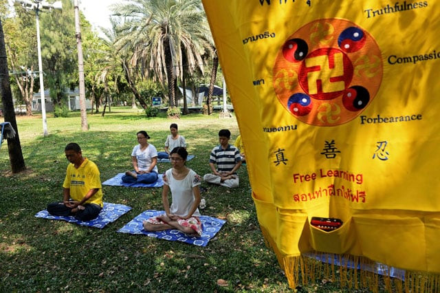 this picture taken on march 14 2016 shows chinese falun gong practicioners and asylum seekers meditating in bangkok a rising tide of refugees from around the globe are pinning their hopes on thailand a buddhist country whose porous borders easily obtainable visas and friendly reputation are a compelling draw for those fleeing persecution especially in a pinch but instead of finding the haven many hoped for asylum seekers in bangkok are relegated to a life in the shadows constantly dogged by fears of imprisonment and deportation by a government that still refuses to legally recognise refugees a plight that has only worsened under junta rule photo afp this picture taken on march 14 2016 shows chinese falun gong practicioners and asylum seekers meditating in bangkok a rising tide of refugees from around the globe are pinning their hopes on thailand a buddhist country whose porous borders easily obtainable visas and friendly reputation are a compelling draw for those fleeing persecution especially in a pinch but instead of finding the haven many hoped for asylum seekers in bangkok are relegated to a life in the shadows constantly dogged by fears of imprisonment and deportation by a government that still refuses to legally recognise refugees a plight that has only worsened under junta rule photo afp