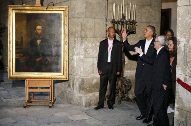 u s president barack obama stands near a portrait of abraham lincoln as he is guided on a tour of old havana in havana march 20 2016 photo reuters u s president barack obama stands near a portrait of abraham lincoln as he is guided on a tour of old havana in havana march 20 2016 photo reuters