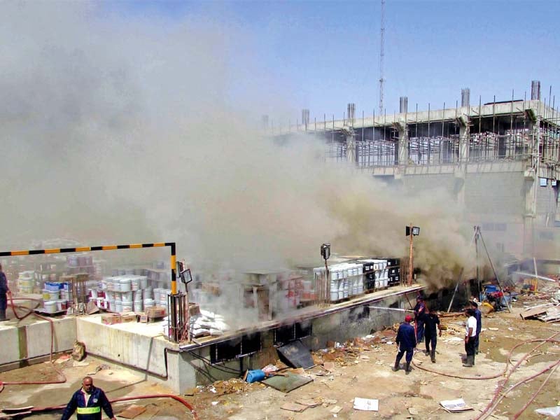 several workers fell unconscious due to the clouds of smoke that engulfed the area surrounding the factory photo mohammad azeem express