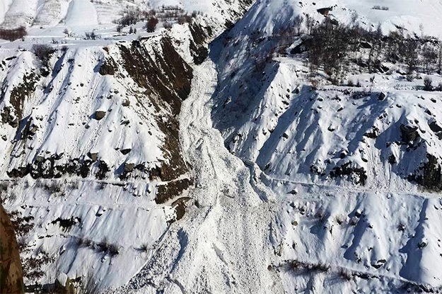 an aerial view of avalanche which hit 9 people in karimabad valley photo onlne