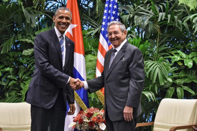 us president barack obama l and cuban president raul castro shake hands during a meeting at the revolution palace in havana on march 21 2016 photo afp us president barack obama l and cuban president raul castro shake hands during a meeting at the revolution palace in havana on march 21 2016 photo afp