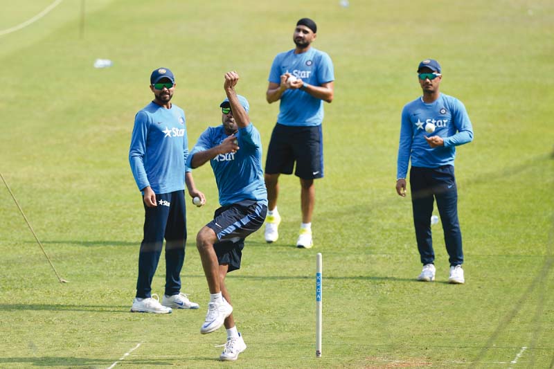 indian bowlers l r ravindra jadeja ravichandran ashwin harbhajan singh and pawan negi take part in a net practice session on the eve of their match against bangladesh photo afp