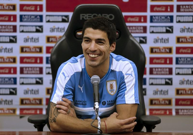 uruguay 039 s national soccer team striker luis suarez gestures during a news conference after a training in preparation for qualifying matches against brazil and peru photo reuters