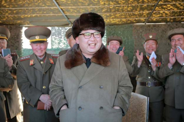 leader kim jong un c inspects the operation of a new large caliber multiple rocket launching system at an undisclosed location in north korea photo afp leader kim jong un c inspects the operation of a new large caliber multiple rocket launching system at an undisclosed location in north korea photo afp