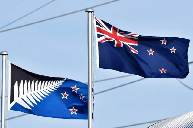 the current new zealand flag r flutters next to the proposed alternative flag in wellington photo afp the current new zealand flag r flutters next to the proposed alternative flag in wellington photo afp