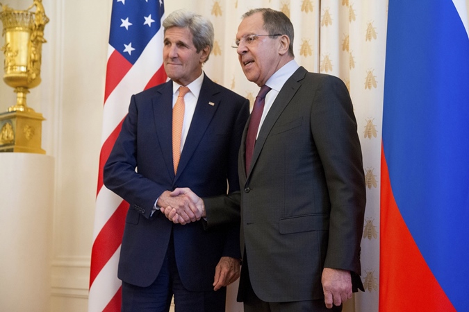 russian foreign minister sergei lavrov r shakes hands with us secretary of state john kerry during a meeting in moscow on march 24 2016 photo afp