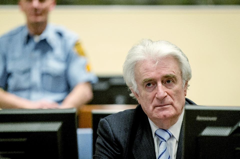 bosnian serb wartime leader radovan karadzic sits in the courtroom for the reading of his verdict at the international criminal tribunal for former yugoslavia icty in the hague on march 24 2016 photo afp