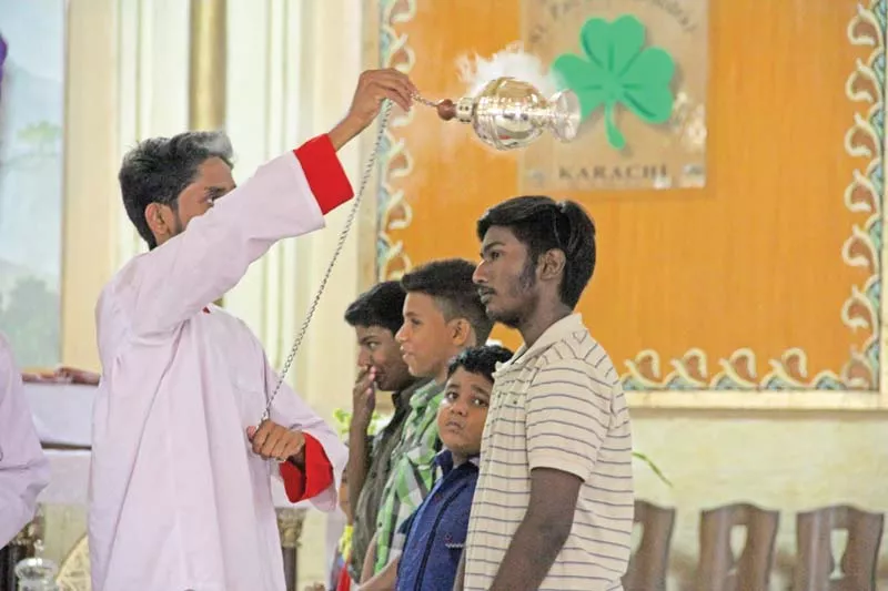 it is a great honour for the 12 boys selected to have their feet washed by the priest some boys giggled in excitement while others solemnly watched the sacred process photo ayesha mir express it is a great honour for the 12 boys selected to have their feet washed by the priest some boys giggled in excitement while others solemnly watched the sacred process photo ayesha mir express