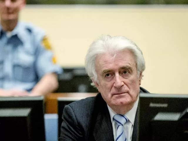 bosnian serb wartime leader radovan karadzic sits in the courtroom for the reading of his verdict at the international criminal tribunal for former yugoslavia icty in the hague on march 24 2016 photo afp