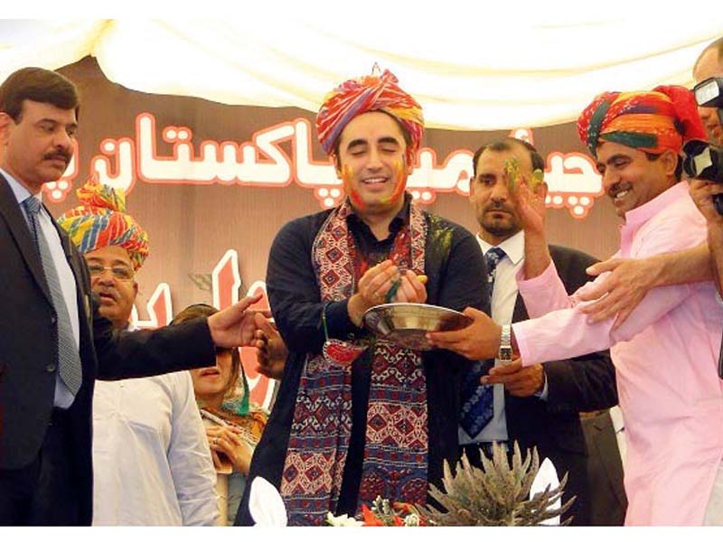 bilawal readies to throw coloured powder in the air photo inp