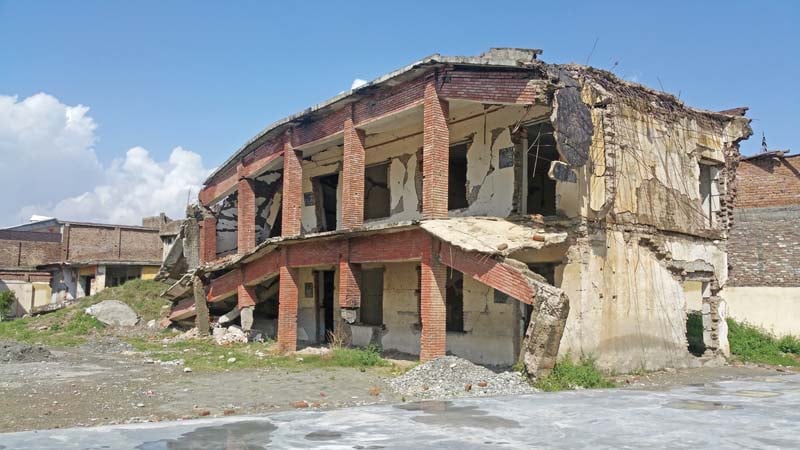 the dilapidated structure of the school photo express