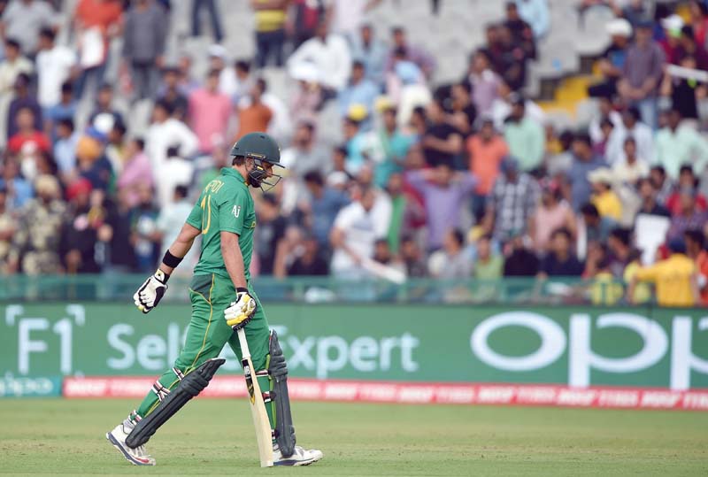 afridi walks back after being dismissed in what is likely to be his last international appearance photo afp