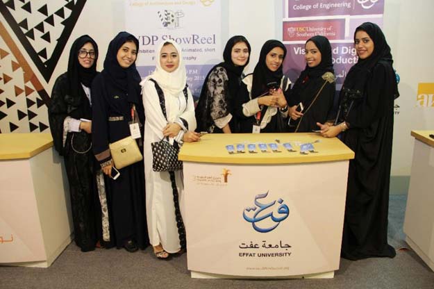 saudi students from effat university are seen at a booth promoting their visual and digital production programme on march 24 2016 at the saudi film festival the gulf coast city of dammam photo afp