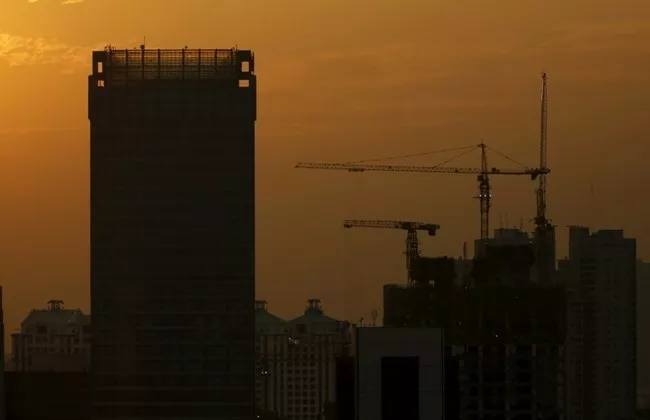 construction cranes are seen along the city skyline during sunset in jakarta indonesia march 24 2016 photo reuters