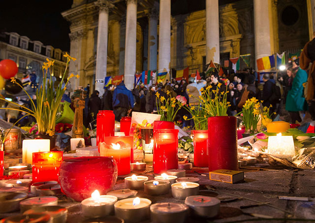 people mourn the victims of brussels attacks photo afp
