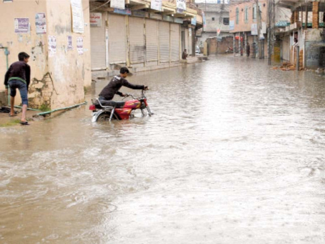 poor drainage leads to waterlogging in many areas of rawalpindi and sewage from open drains often mixes in with the rainwater creating health hazards and leaving foul smells in the areas photo express poor drainage leads to waterlogging in many areas of rawalpindi and sewage from open drains often mixes in with the rainwater creating health hazards and leaving foul smells in the areas photo express
