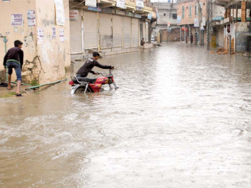 kohati bazaar residents upset by overflowing sewage drains