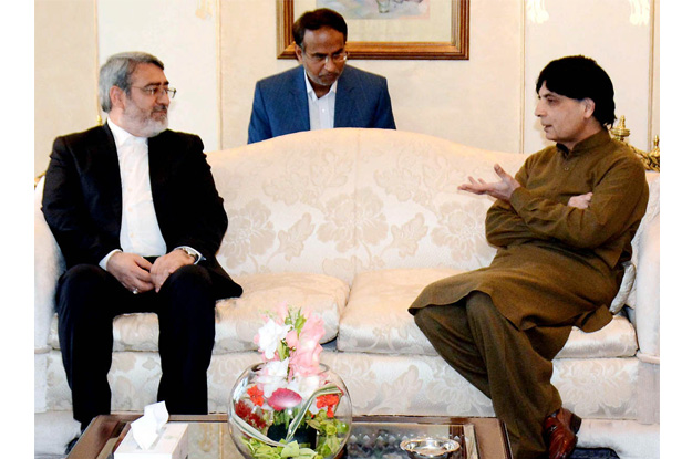 chaudhry nisar ali khan and his iranian counterpart abdolreza rahmani fazl exchanging views during their meeting photo nni